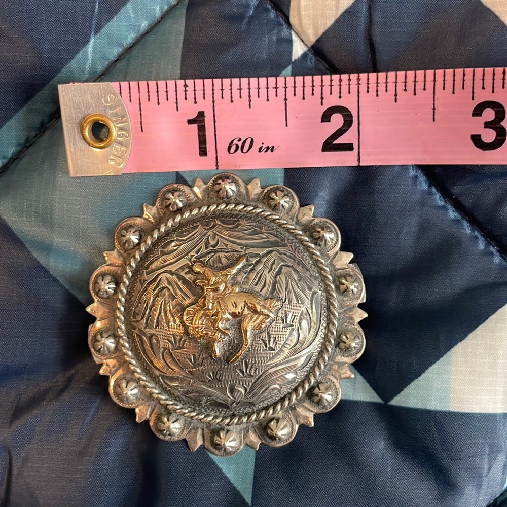 Elk Creek solid sterling with gold fill bronc rider concho barrette.